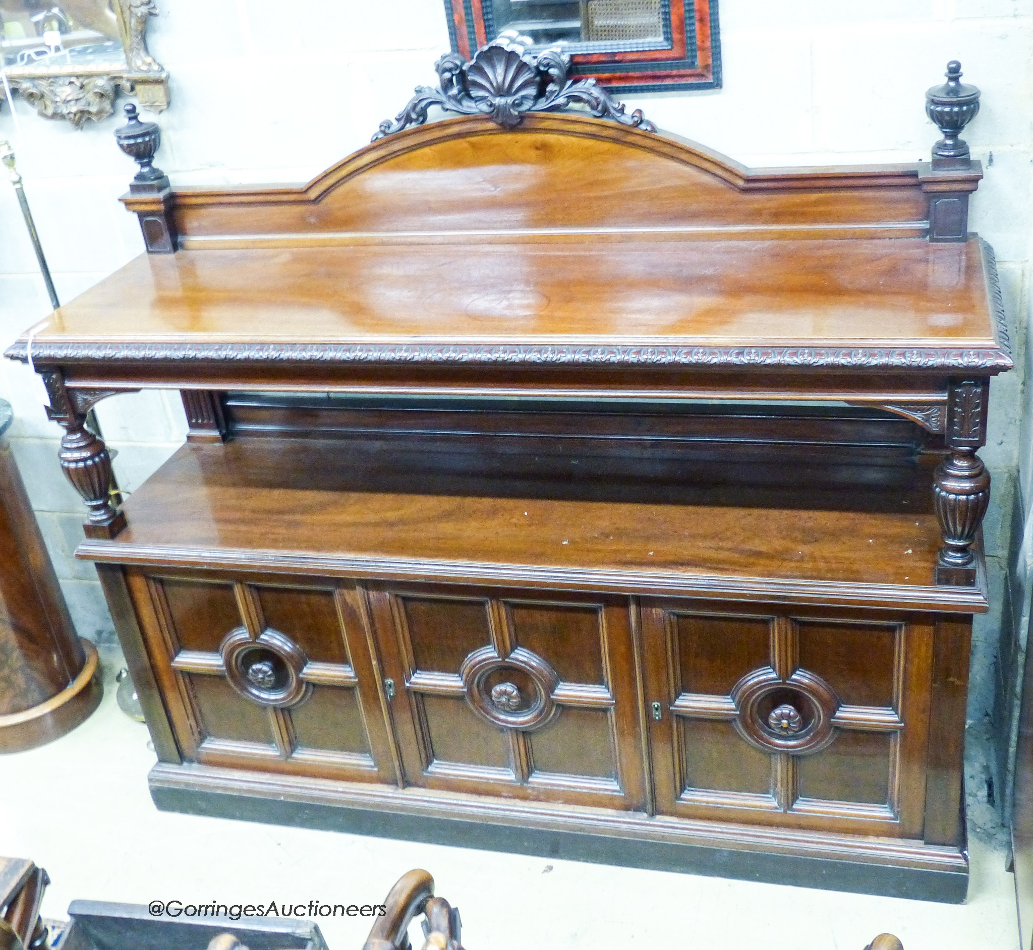 A Victorian Maple & Co. carved mahogany two tier buffet, length 182cm, depth 54cm, height 162cm